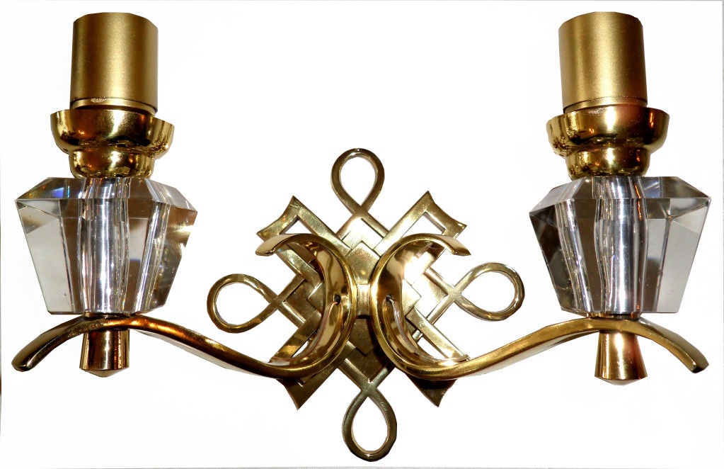 French Neoclassical Polished Brass and Faceted Glass pair of Sconces, Wall lights in Jules Leleu style.
Priced by pair. We have 4 Pair available.
Pair with three arms available Stock TB # C77c $ 3950 image 9.)
Three pairs available. Priced by