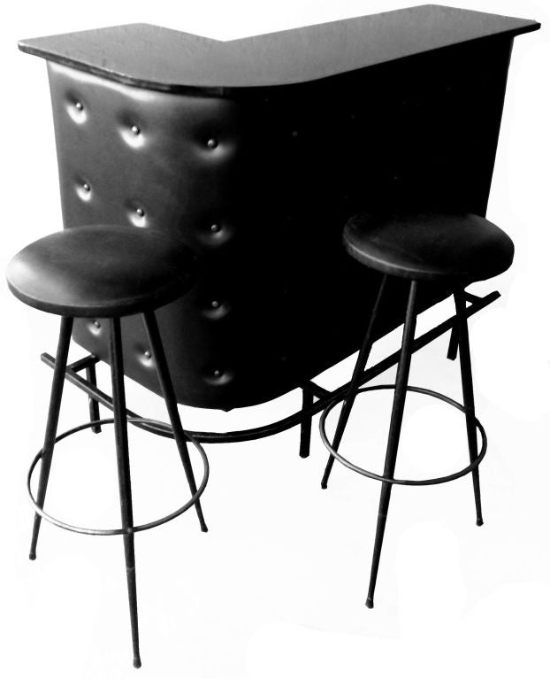 Bar in black Leather, Wood and Iron designed by Jacques Adnet.
Sold with two black top seat stools.
14 inches D black laminated top, 14 inches D inside.
Stool: 30.5 inches H, 13 inches Diameter black top seat.
Provenance Image 7: Catalogue Drouot,