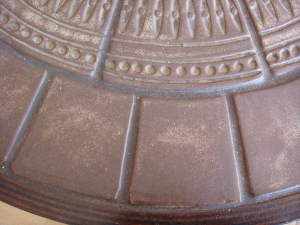 Round coffee table by Roger CAPRON