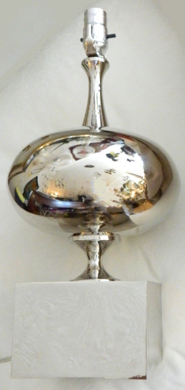 Mid-Century Modern Table Lamp by Barbier, France. 
Chrome and Nickel-plated oval center ball and square base.
Wired for the US and takes a regular or LED light bulb. 
Base measures 6 x 6 inches.