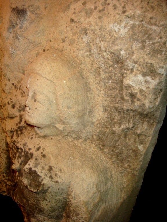 Italian old fragments of stones. Men and women faces