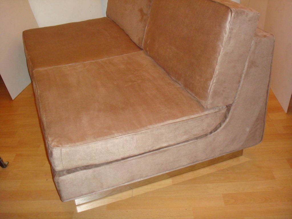 French Mid-Century Modern low Sofa and matching Lounge Chair designed by Jacques Charpentier.
Newly reupholstered in beige Ultrasuede and features a Chrome base.
The sofa design was published in 
