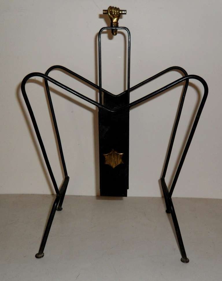 French Magazine Rack by J.ADNET with a bronze hand and star.