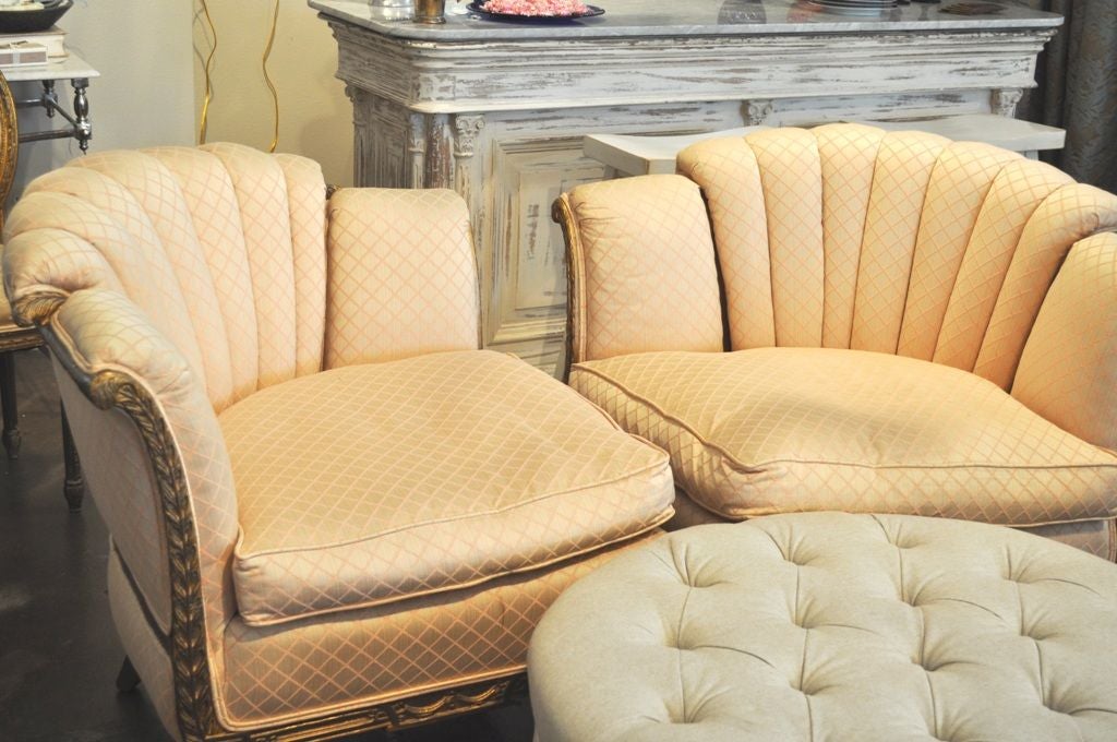 Upholsterd in pink with a gold frame and channel-backed corner chairs or sofa. These versatile comfortable chairs are unusual and stylish.