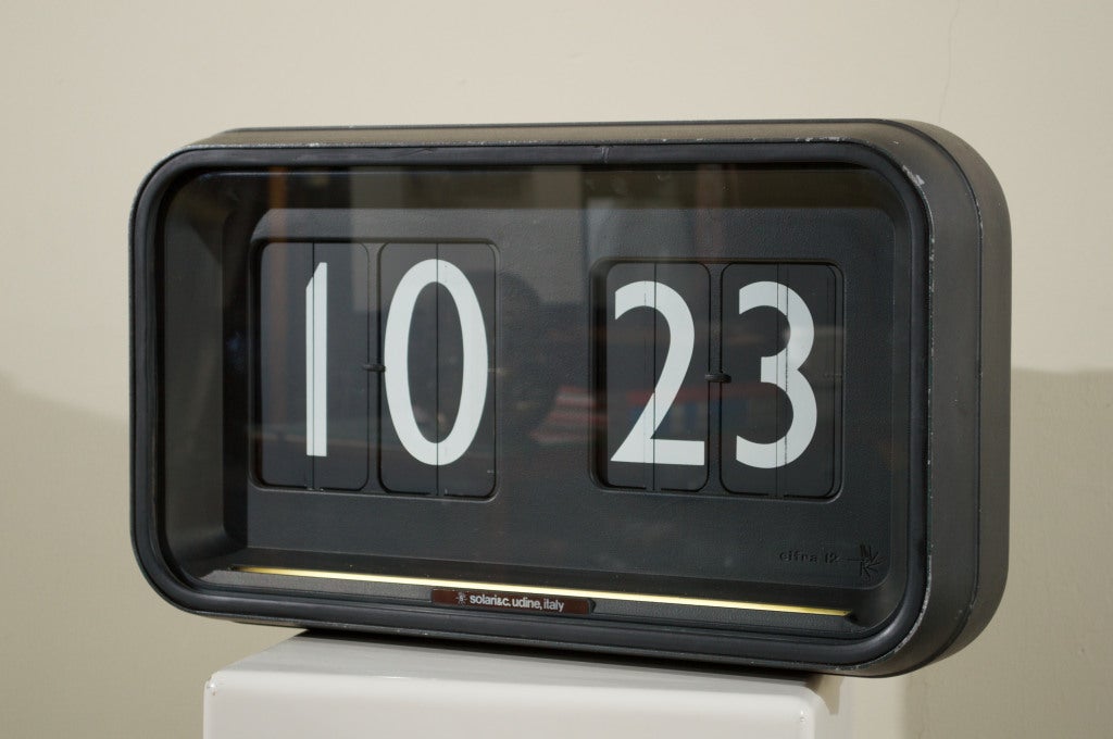 Made in Udine, Italy by Solari & Co. enameled cast aluminum and glass fluorescent lighted flip clock