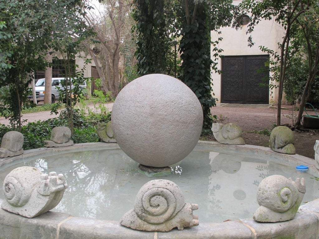 Dramatically large scaled garden spheres.