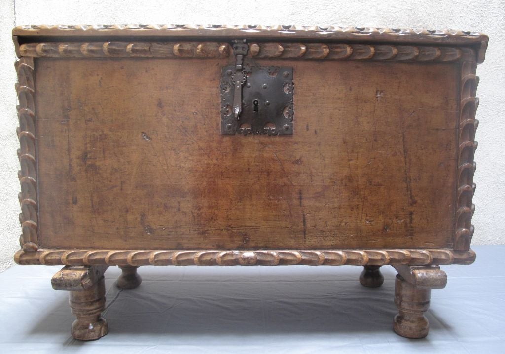 18th century sabino wood trunk which can be used as a side table and lowered since the feet are 4.75