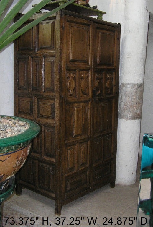 18th century Spanish colonial armoire with a secret compartment in back for weapons like rifles, etc.
Front inside depth is 16.5".