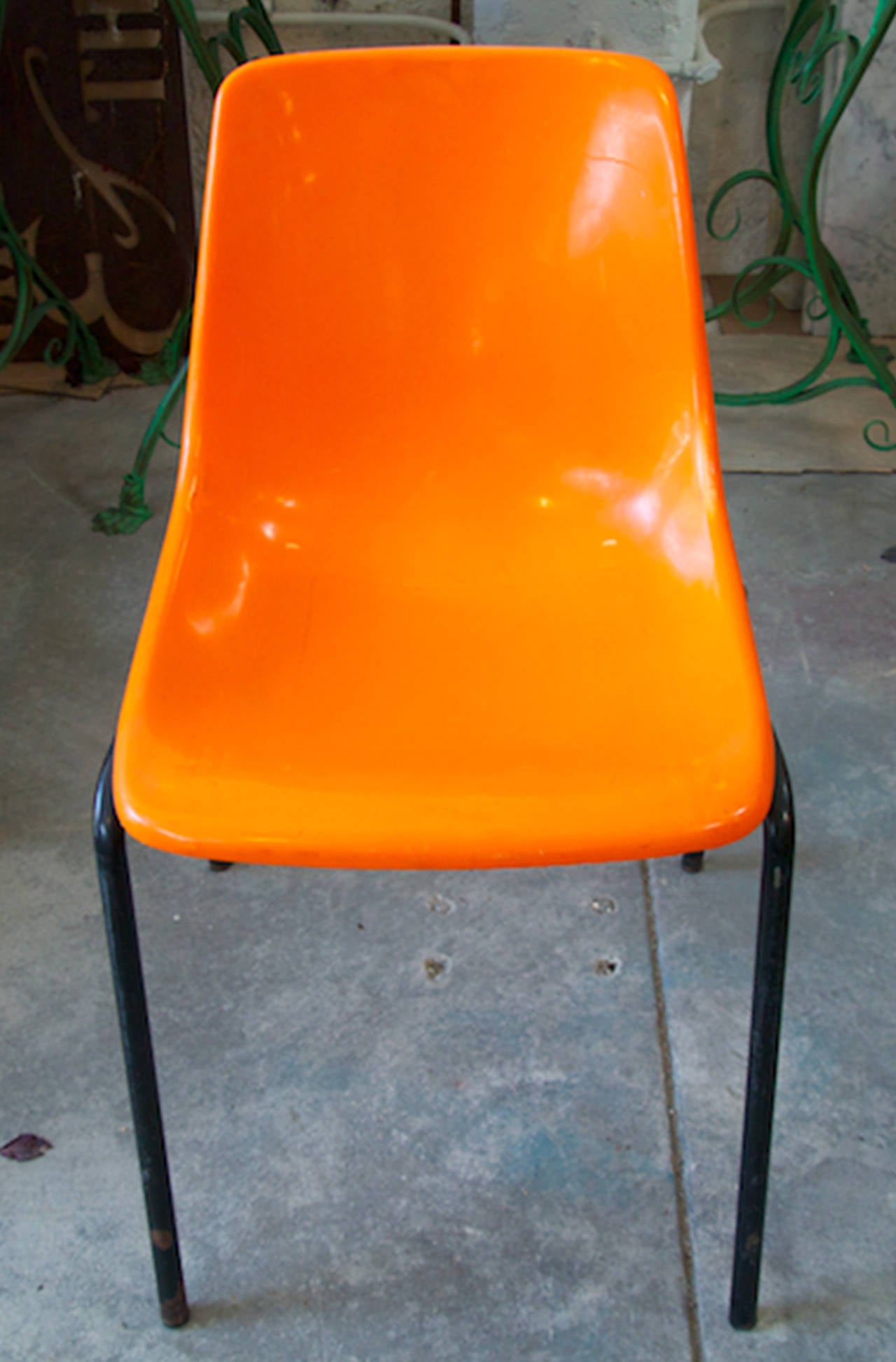 French Set of 12 Mid Centruy Orange Plastic and Metal Chairs