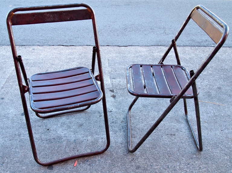 Pair of French industrial metal folding chairs with nice patina
Marked 'VILLE D' AIX'
From Aix en Provence