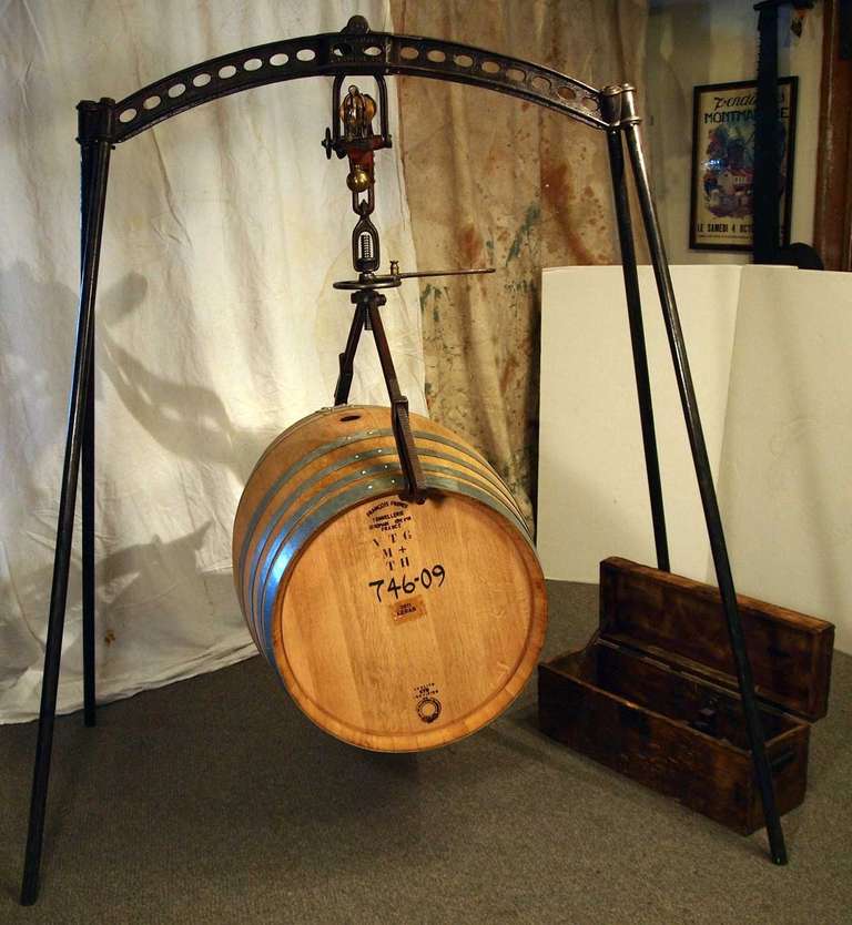 Turn of the 20th century, French cast iron & brass wine barrel scale by A. Marlin of Paris.   Comes with the original transport box for holding the scale, weights and parts.  Scale breaks down for easy transport and quick reassembly