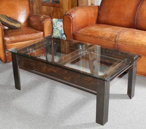 French Industrial cocktail / coffee table,  heavy and bold steel base with very good patina and glass top.
20th C.