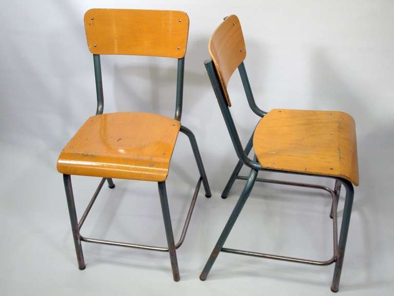 Set of 12 French industrial wood & metal school chairs
Mid-20th C.