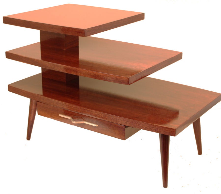 Beautiful and very well made table,do not need more to describe ... with a single central drawer