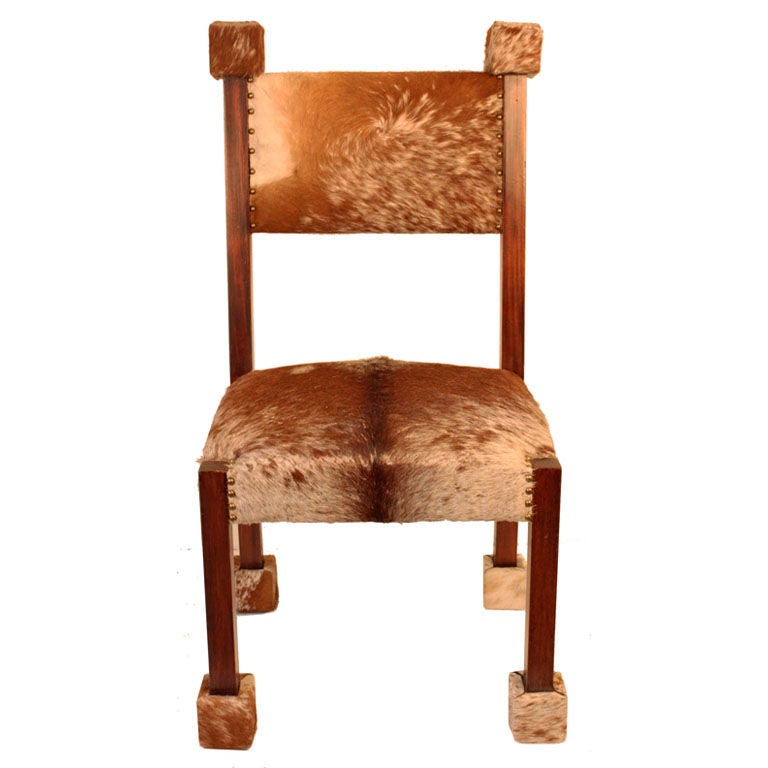 Unusal African Mahogany High Back Cowhide Chair at 1stDibs