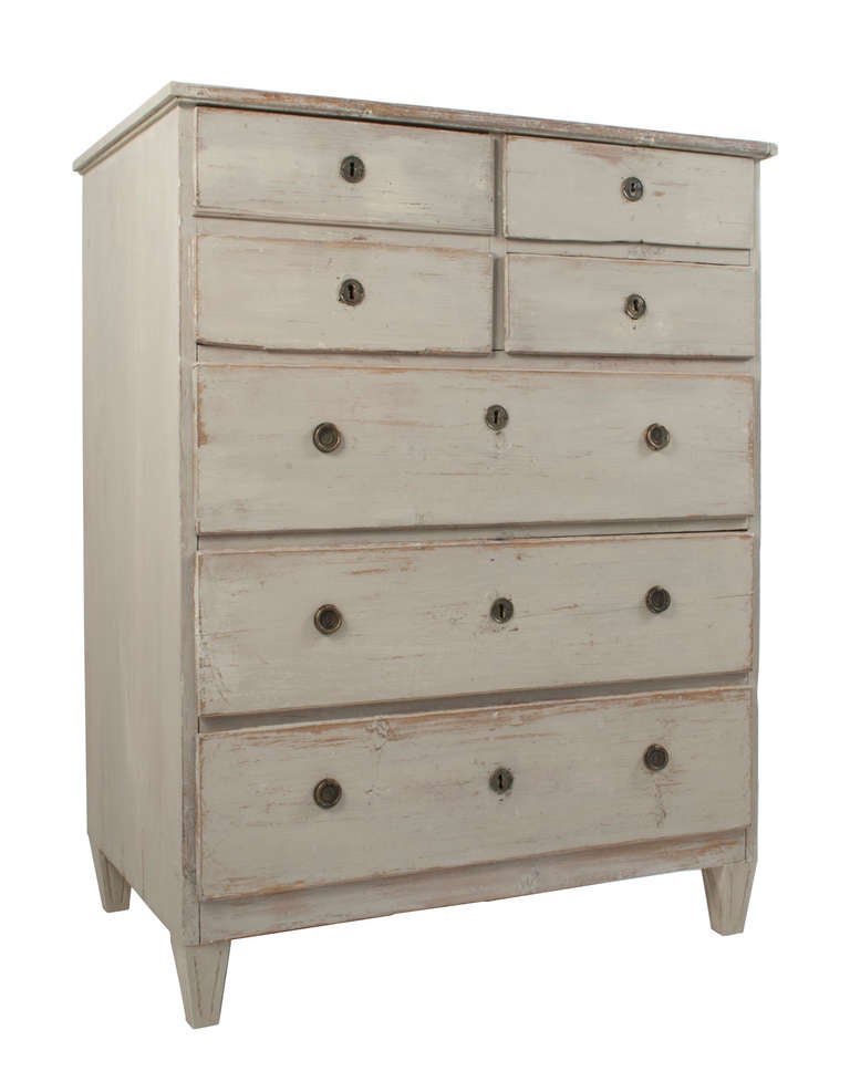 Seven drawer Gustavian Chest in a worn pale grey patina.