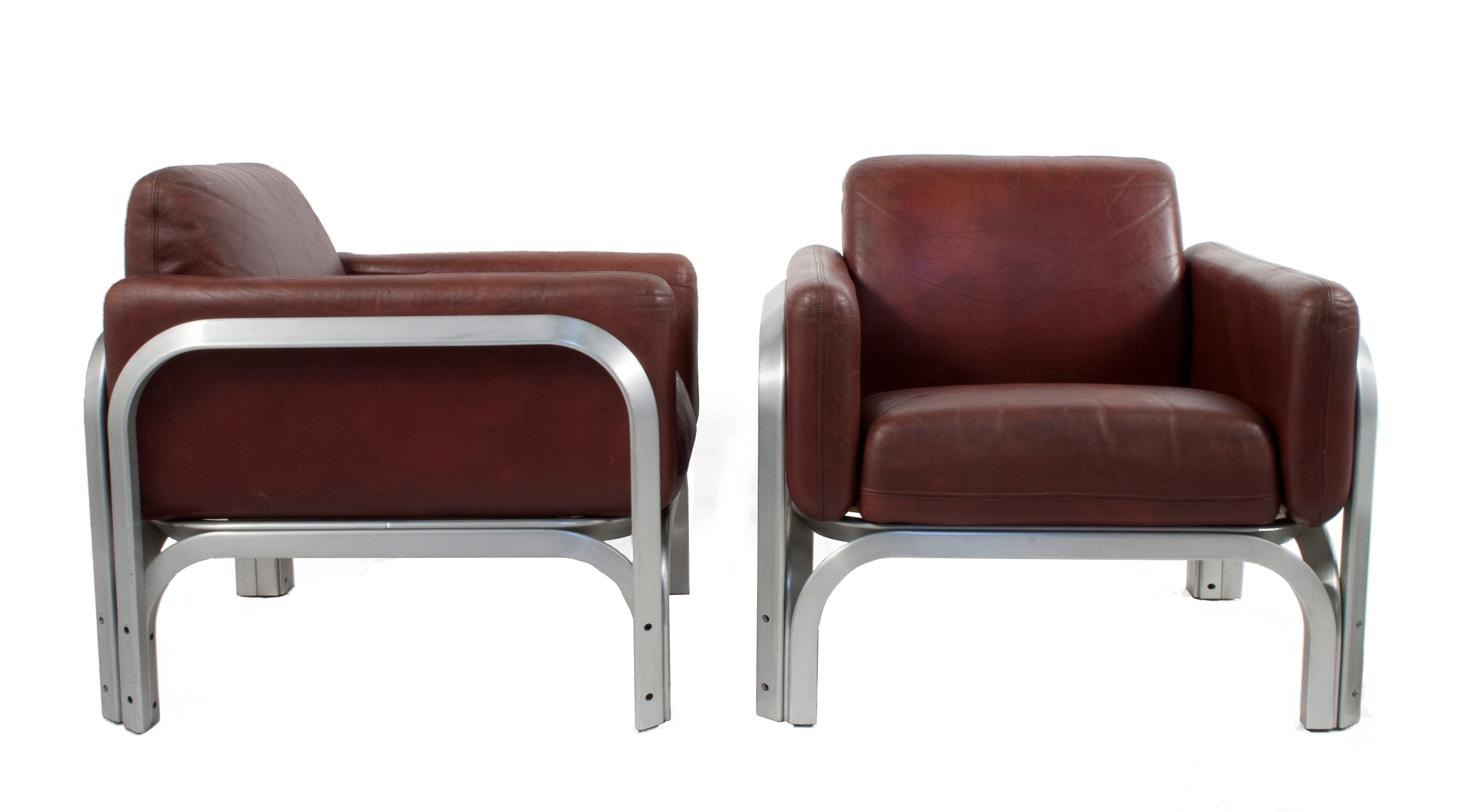 Pair of Leather Lounge Chairs by Jorn Utzen