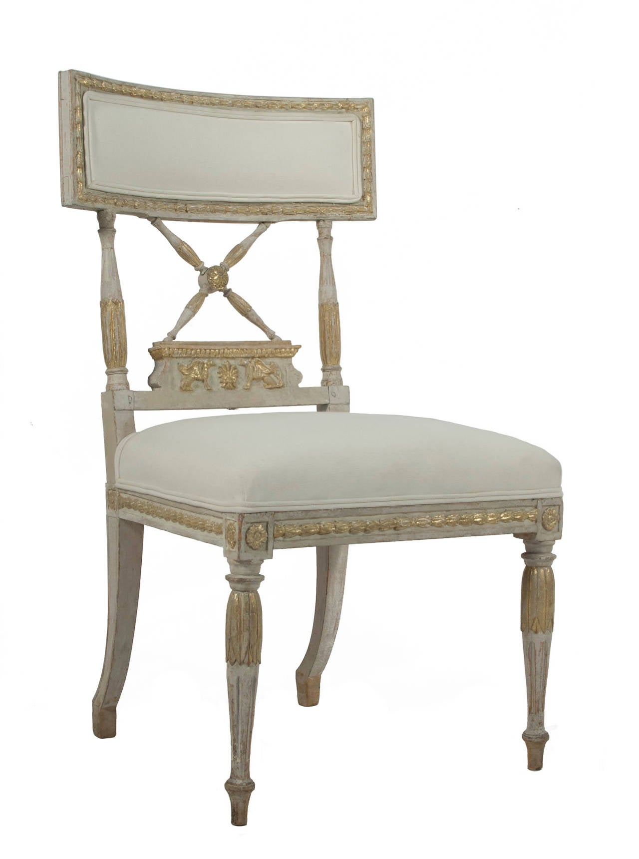 Pair of signed Gustavian side chairs in gold leaf and an acorn grey patina by Erik Ohrmark.