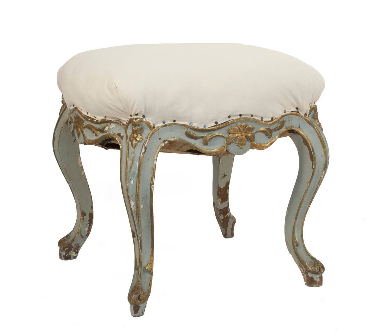 Rococo style stool in a worn pale blue and gilded patina.