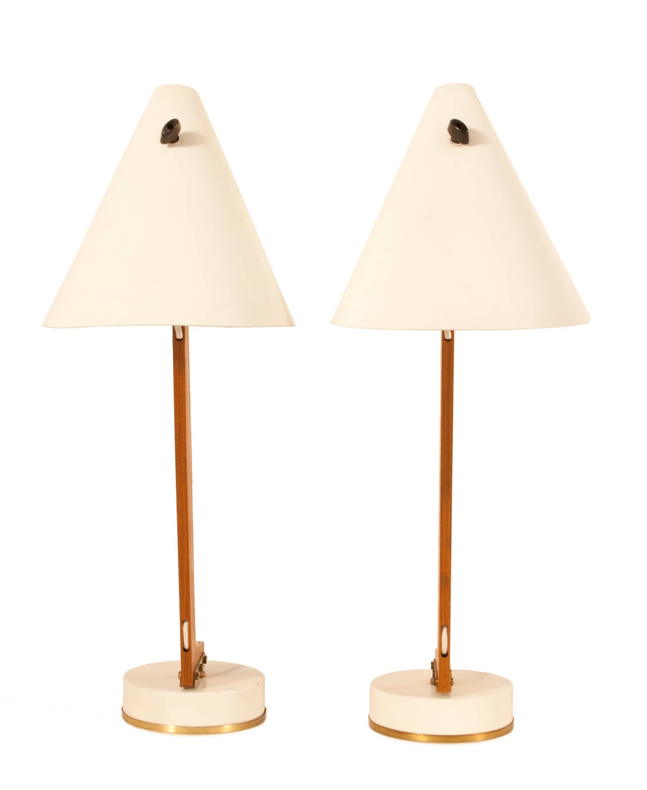 Pair of table lamps in brass, wood and metal that swivel from side to side by Hans-Agne Jakobsson.