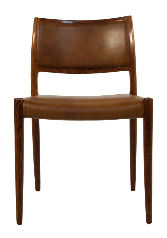 Set of eight leather and rosewood Dining Chairs by Niels Moller.