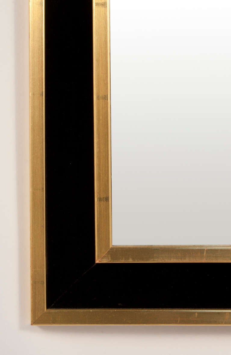 Mirror in brass and black velvet by Estrid Ericson.