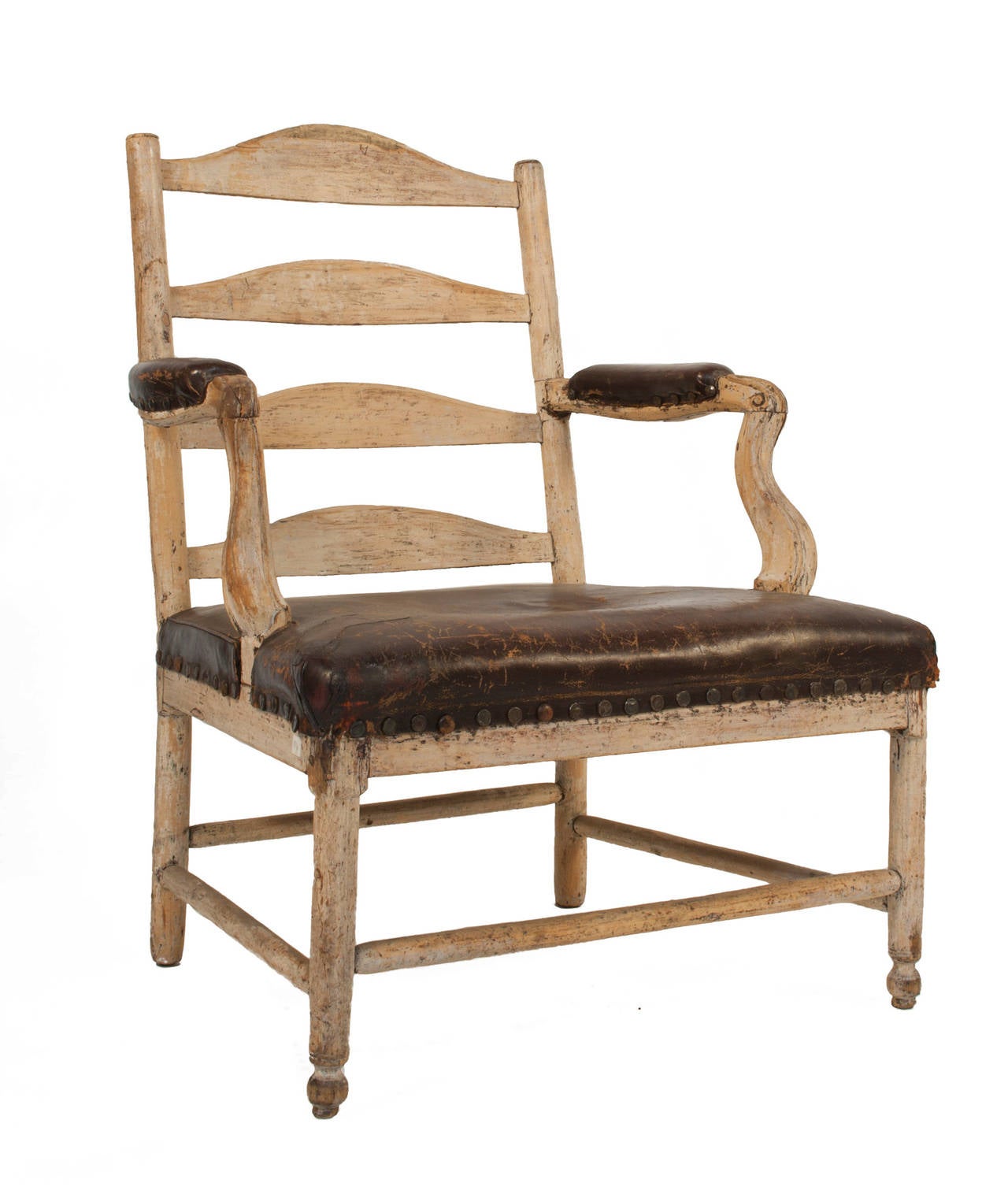 Open back gustavian grips holm arm-chair with leather seat and arm rest in a worn pale cream colored patina.