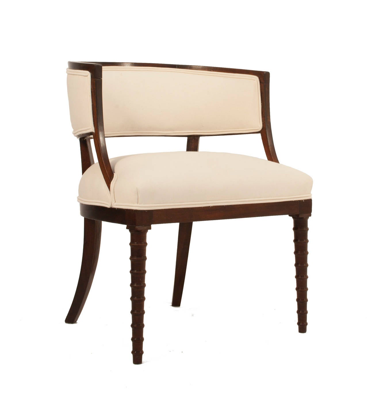 Pair of Gustavian bucket chairs in mahogany with front spindle legs.