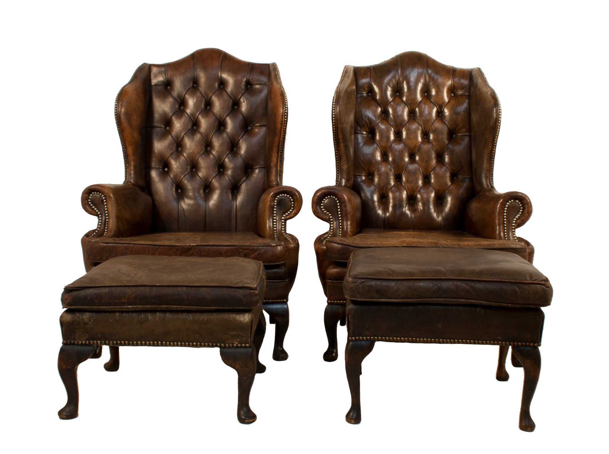 Pair of Leather Wingback Chairs with Stools