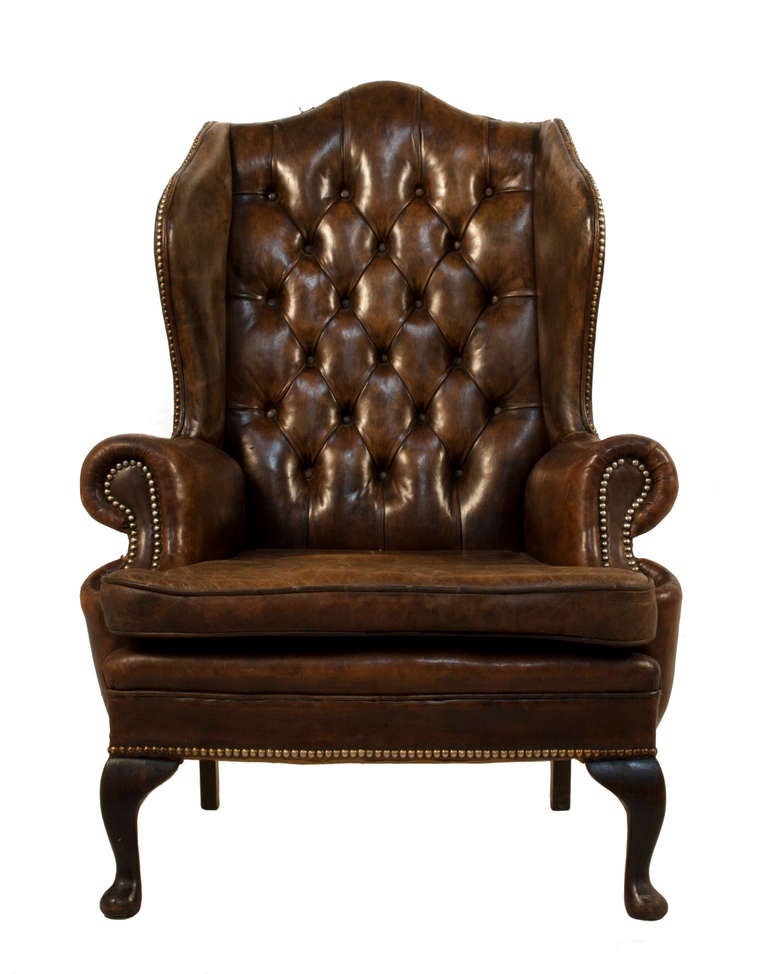 Pair of Leather Wingback Chairs with Stools In Good Condition In Los Angeles, CA