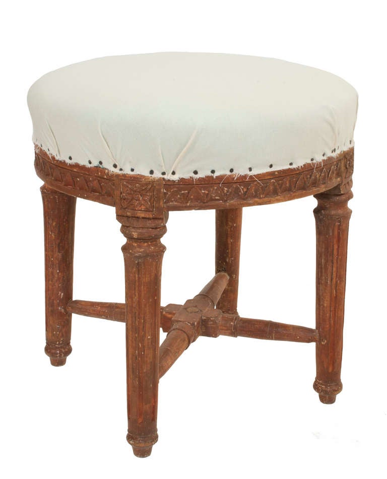 Pair of round Gustavian Stools in a worn red patina.