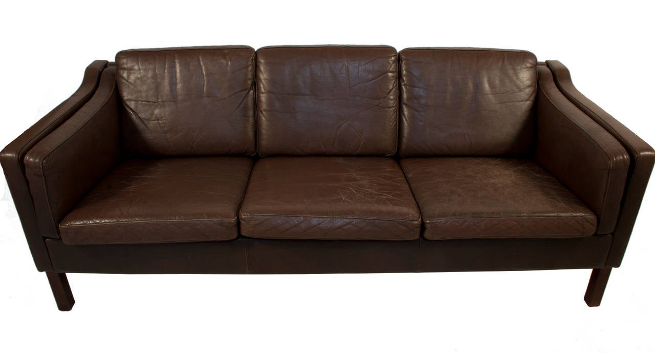 Dark brown leather Sofa.