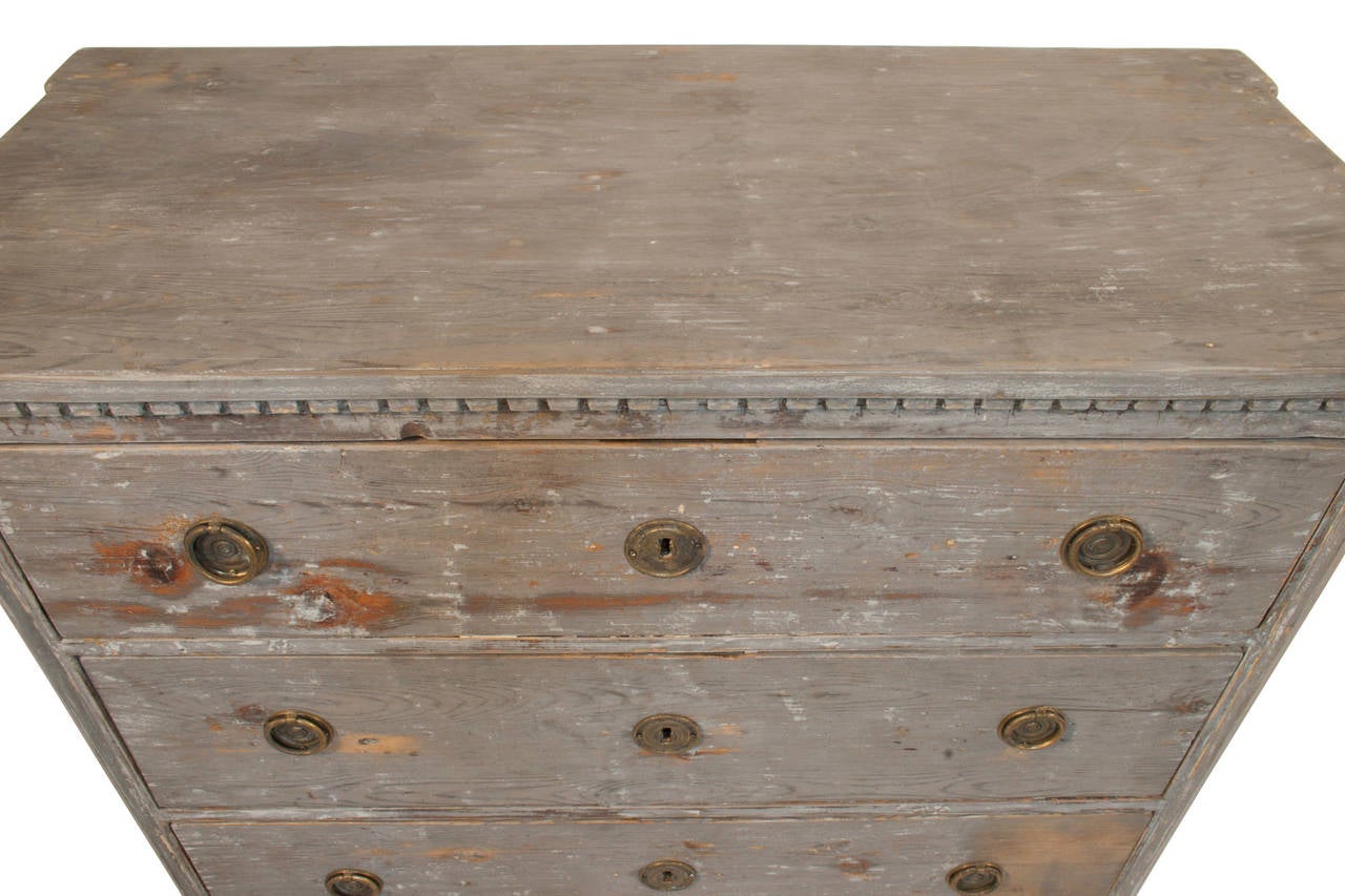 Three-drawer Gustavian chest in a worn blue/grey patina.