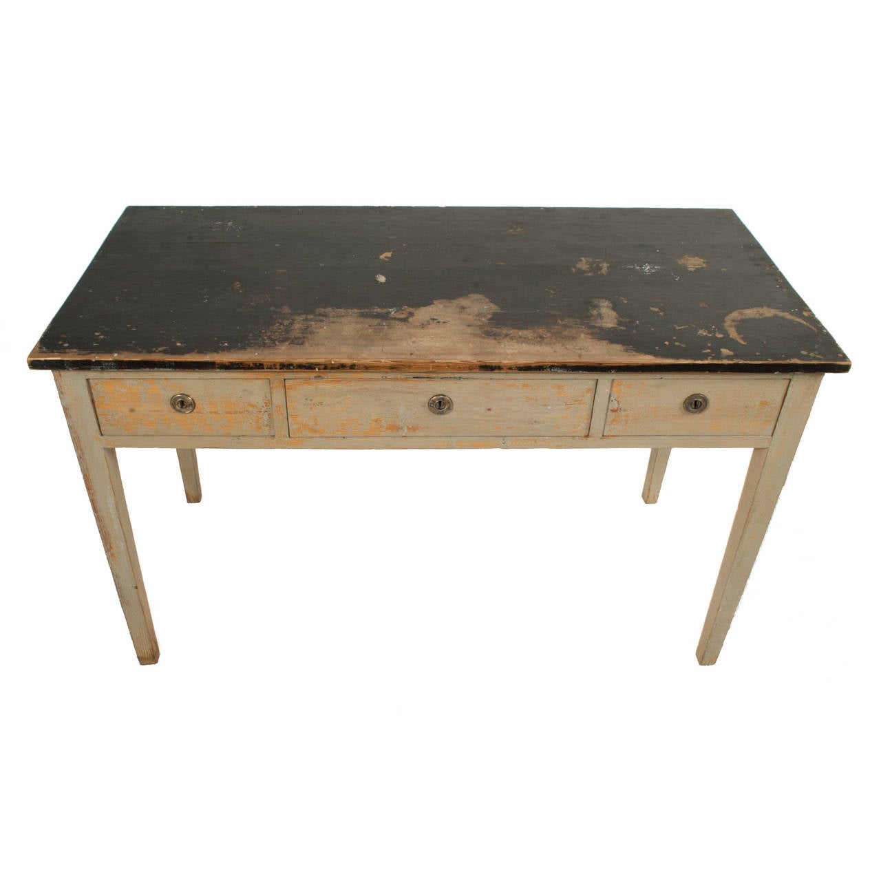 Gustavian console with three drawers in a worn black and cream colored patina.