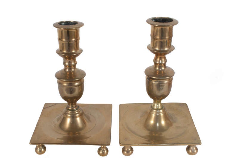 Pair of Baroque candleholders in brass.