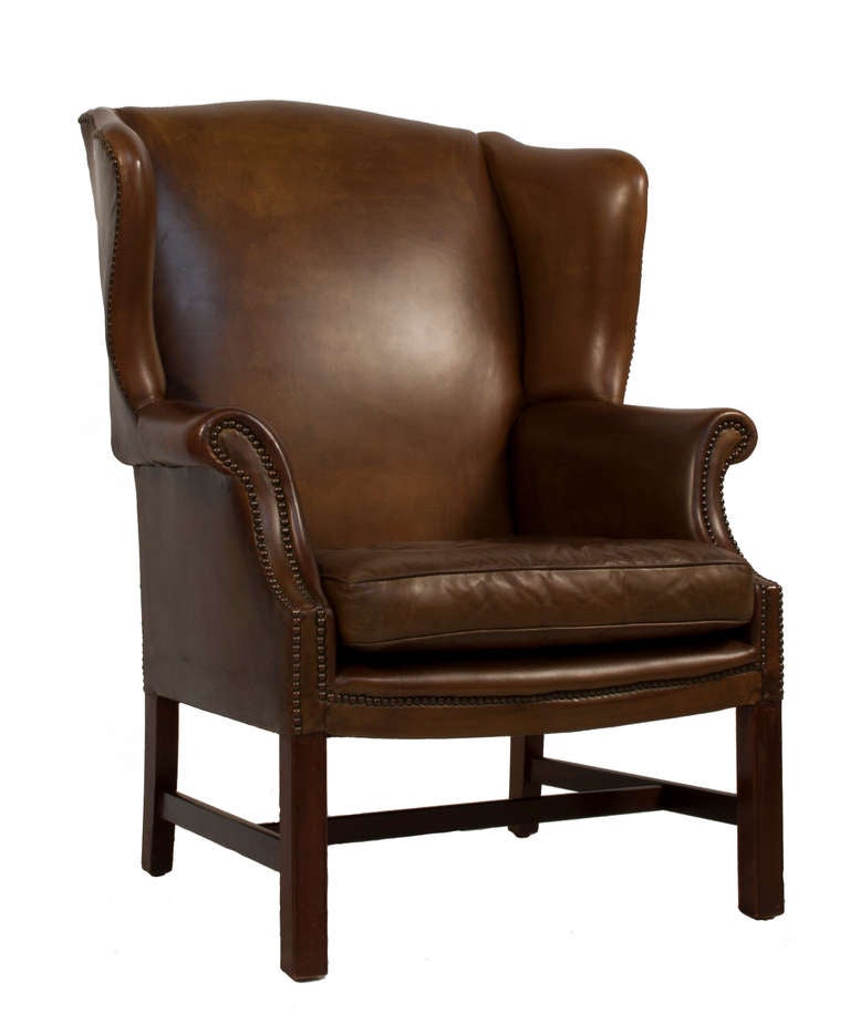Pair of leather Wingback Chairs.