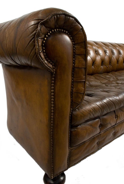 Dark Brown Tufted Leather Chesterfield Sofa.