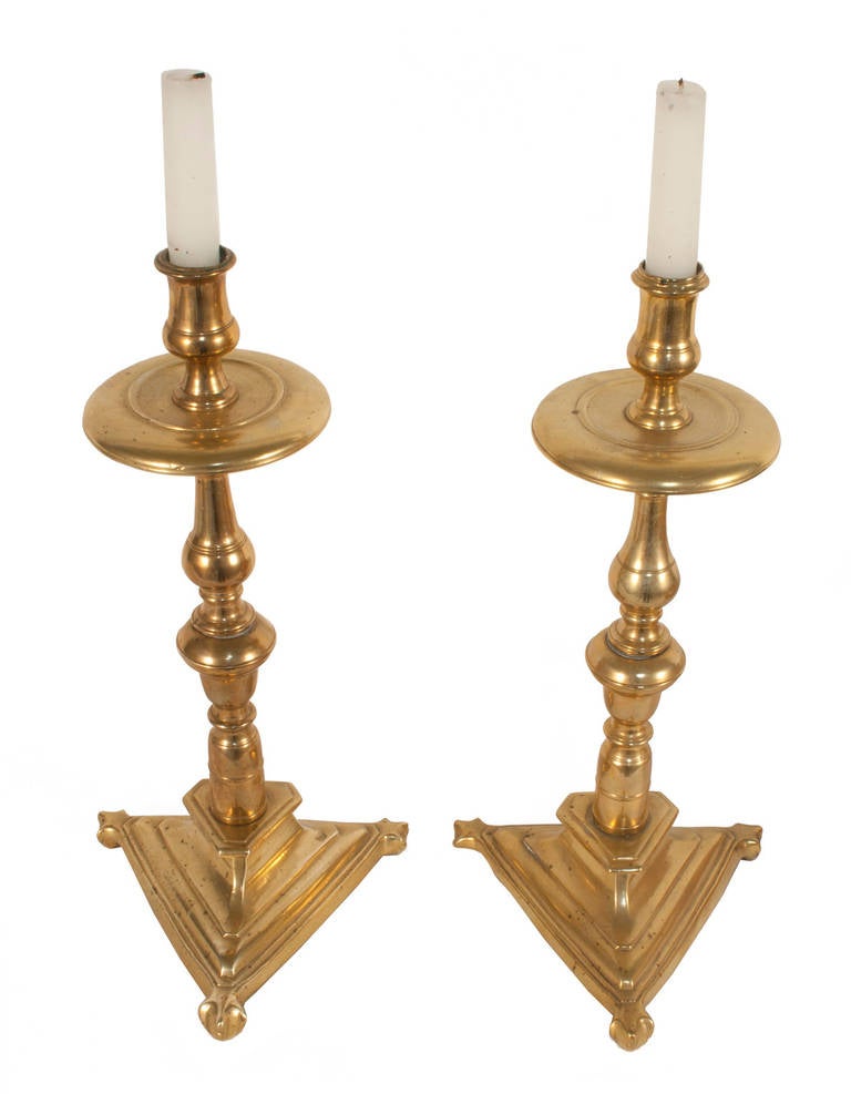 Pair of brass Baroque candleholders.