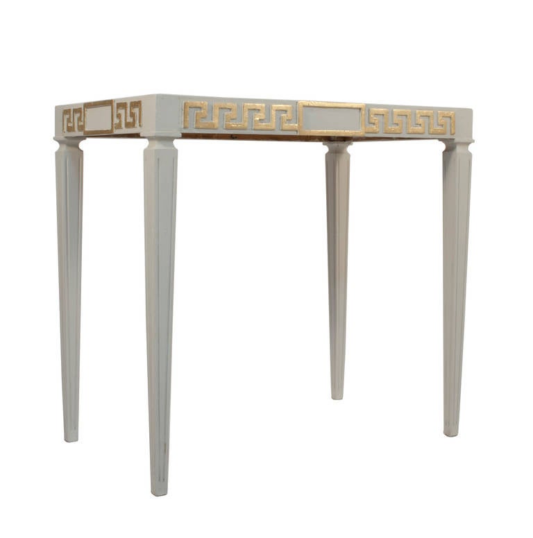White and gilded Swedish grace side table.