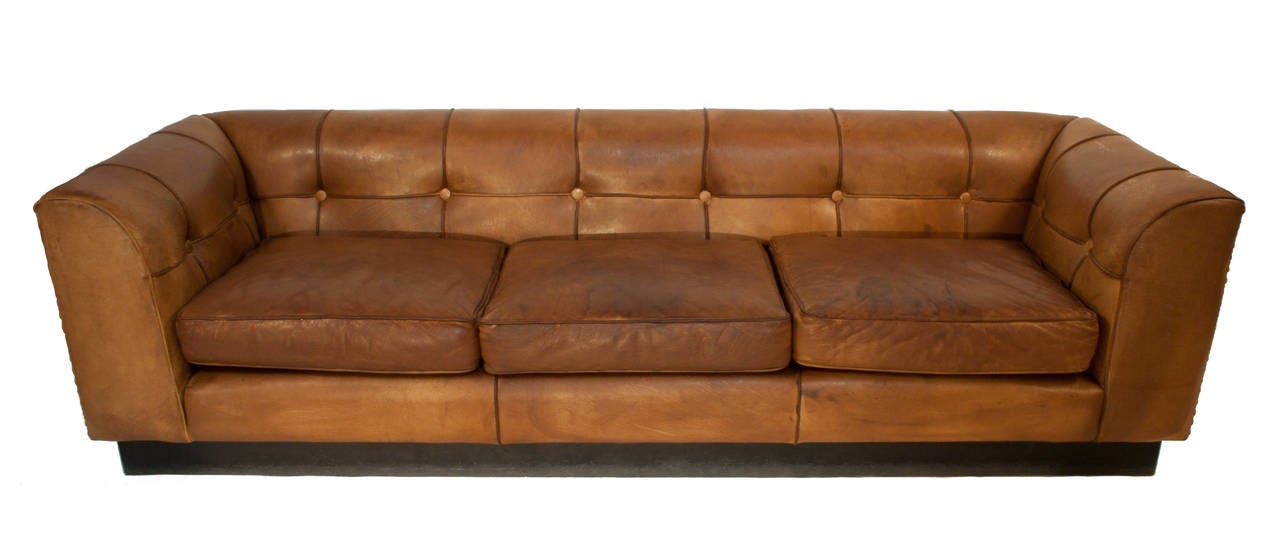 Leather sofa by Arne Norell.