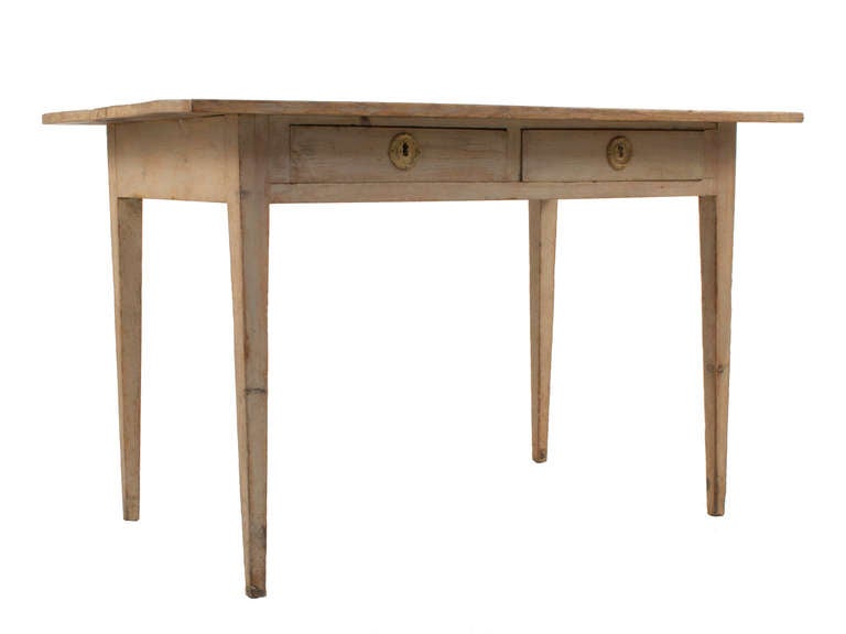 Two drawer Gustavian Desk in a worn pale grey patina.