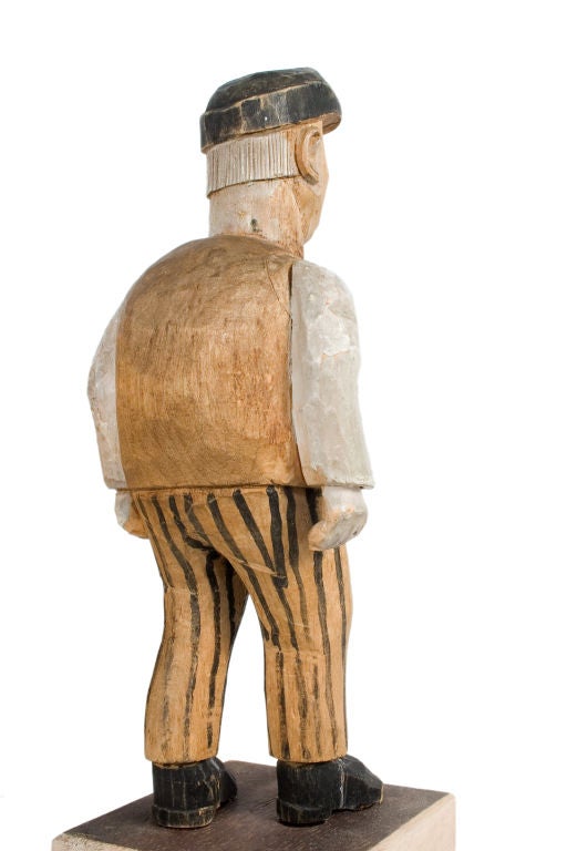 Carved Man with Striped Pants. For Sale