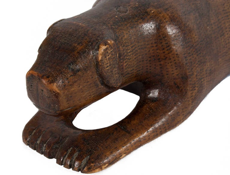 Carved dog in wood, circa 1860.