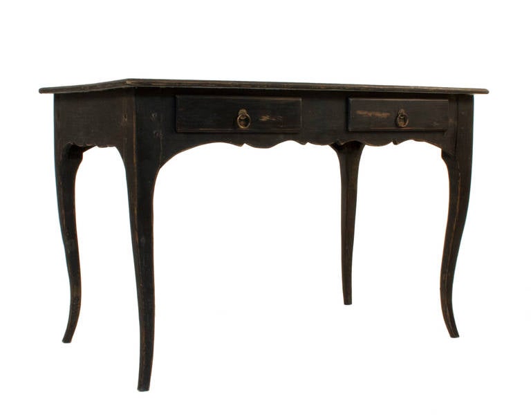 Black Rococo style desk with two drawers.