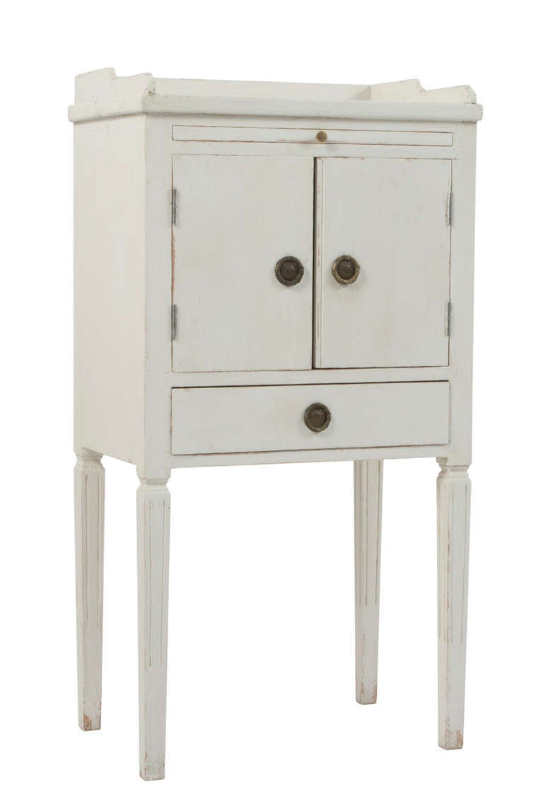Pair of Gustavian Style Nightstands with two doors and a drawer.