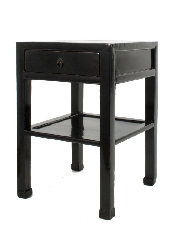 Pair of black lacquered Chinese Side Tables.