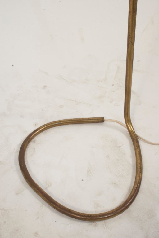 Floor Lamp in brass and leather handle by Hans Bergstrom.