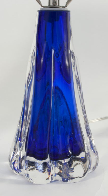 Pair of blue Flygfors Lamps made for Orrefors in the Graal manner where colored glass is encased in another layer of clear transparent glass.
