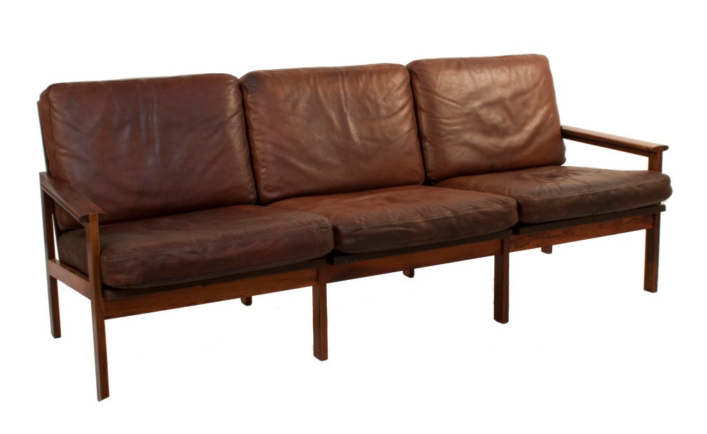 Sofa by Illum Wikkelso in leather and rosewood.