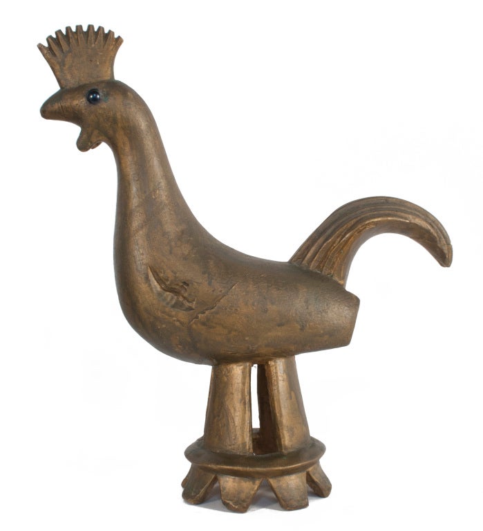 Hand carved Rooster in a worn golden patina.